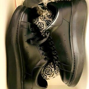 Alexander McQueen black tennis shoes
